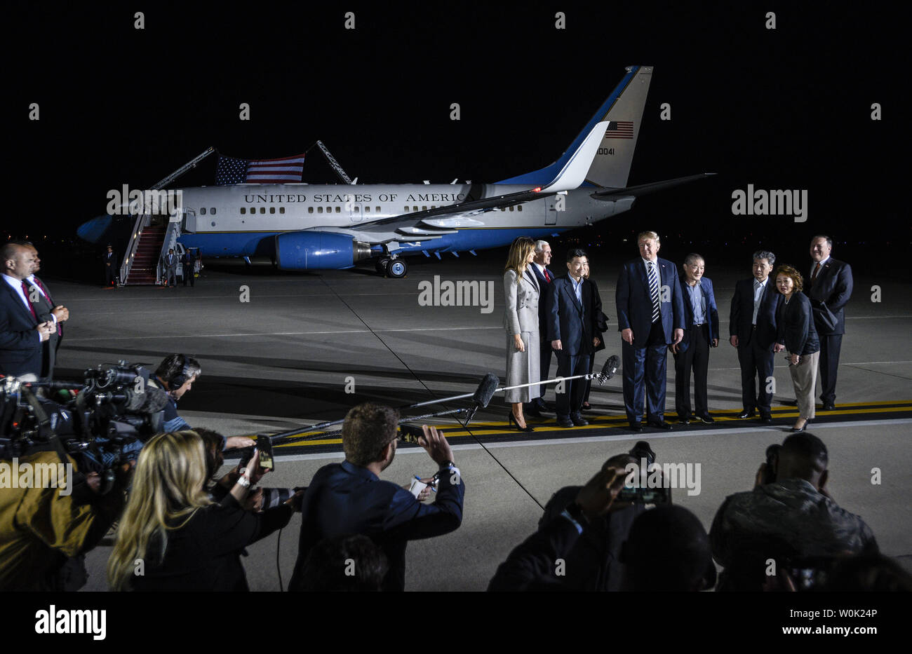 President Donald Trump greets the three American citizens Kim Hak-Song, Kim Dong-Chul, and Kim Sang-Duk, who were detained in North Korea, at Joint Base Andrews in Maryland on May 10, 2018. Photo by Leigh Vogel/UPI Stock Photo