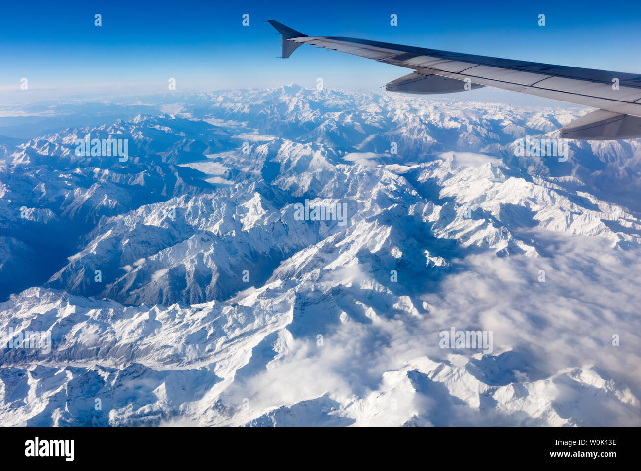 On a flight from Chengdu to Lhasa, Tibet, the Hengduan Mountains, the highest snow mountain in the distance is Mount Gongga, the highest peak in Sichuan. Stock Photo
