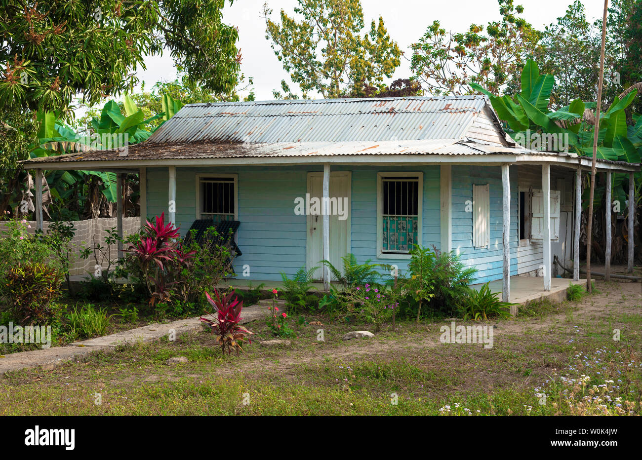 Typical colourful tobacco worker's small house in the rural village of San Juan y Martinez, Pinar del Rio Province, Cuba, Caribbean Stock Photo