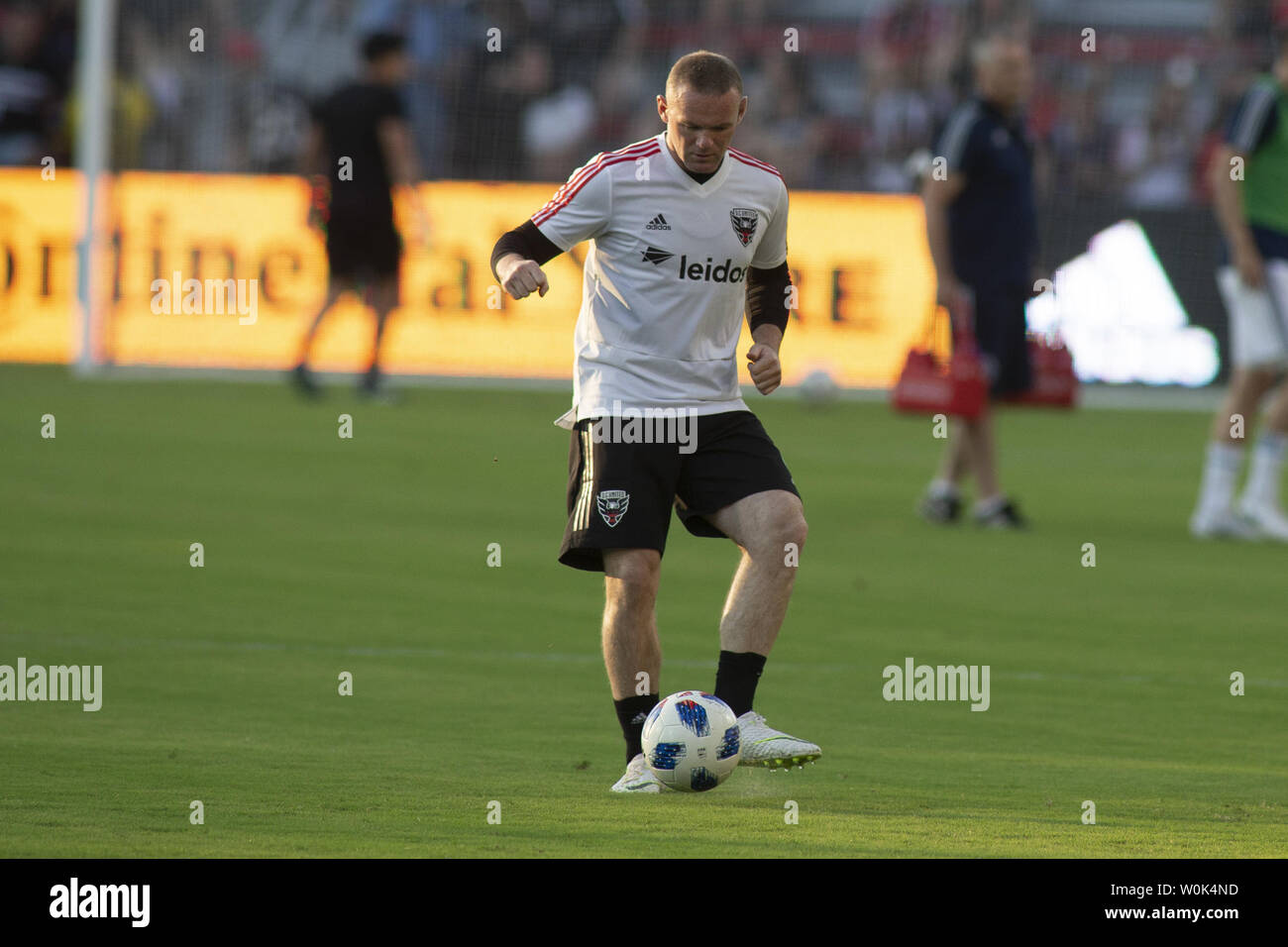 D.C. United forward Wayne Rooney (9) warms up prior to the game between D.C. United and Vancouver Whitecaps at Audi Filed in Washington, DC on July 14, 2018. This is D.C. United's first game at the new field. Photo by Alex Edelman/UPI Stock Photo