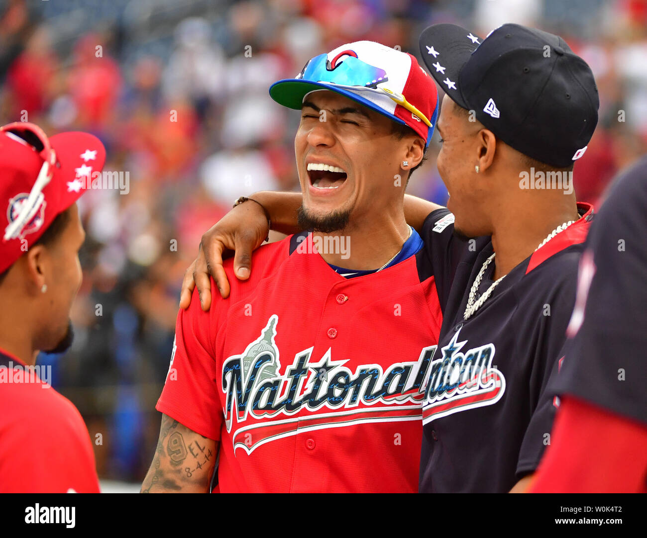 Cleveland Indians Francisco Lindor hugs Chicago Cubs Javier Baez (L) before  the 2018 Home Run Derby at Nationals Park in Washington, D.C. on July 16,  2018. Photo by Kevin Dietsch/UPI Stock Photo - Alamy