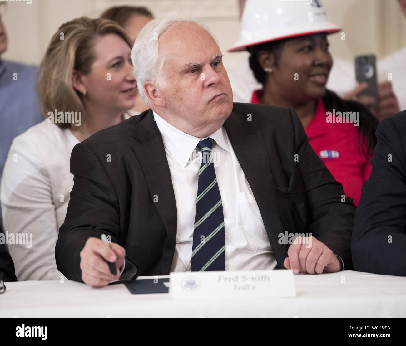 Fred Smith, CEO of FedEx, attends an event where President Donald Trump signed an executive order establishing the President’s National Council for the American Worker and the American Workforce Policy Advisory Board, at the White House in Washington, D.C. on July 19, 2018. The programs will expand worker training and apprenticeships and increase investment on training unskilled and undersupplied workers. Photo by Kevin Dietsch/UPI Stock Photo
