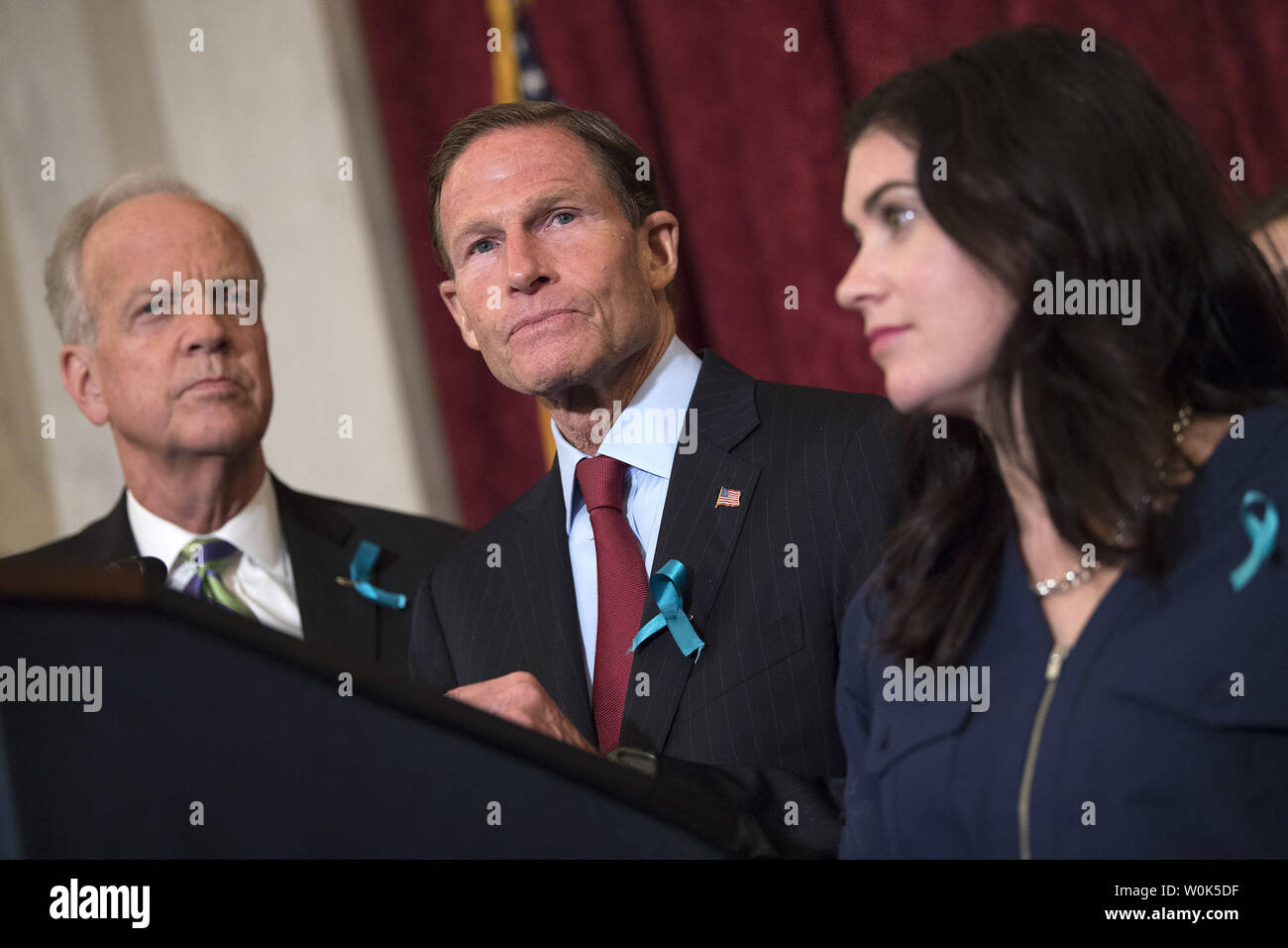 Sen. Richard Blumenthal, D-CT, (C), and Sen. Jerry Moran, R-KS (L), speaks alongside victims of convicted child molester and former Team USA Olympic doctor Larry Nassar, during a press conference on abuse within gymnastics and youth sports and the necessary reforms needed to keep young athletes safe, on Capitol Hill in Washington, D.C. on July 24, 2018.   Photo by Kevin Dietsch/UPI Stock Photo