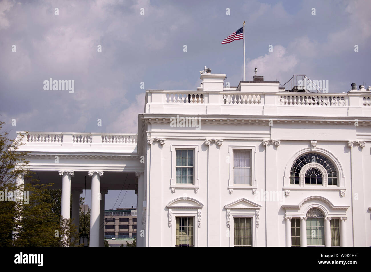 The American flag on the White House is returned to full staff after