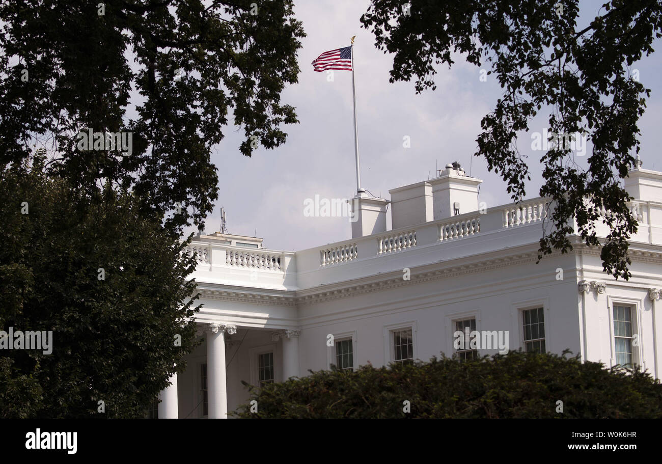 The American flag on the White House is returned to full staff after