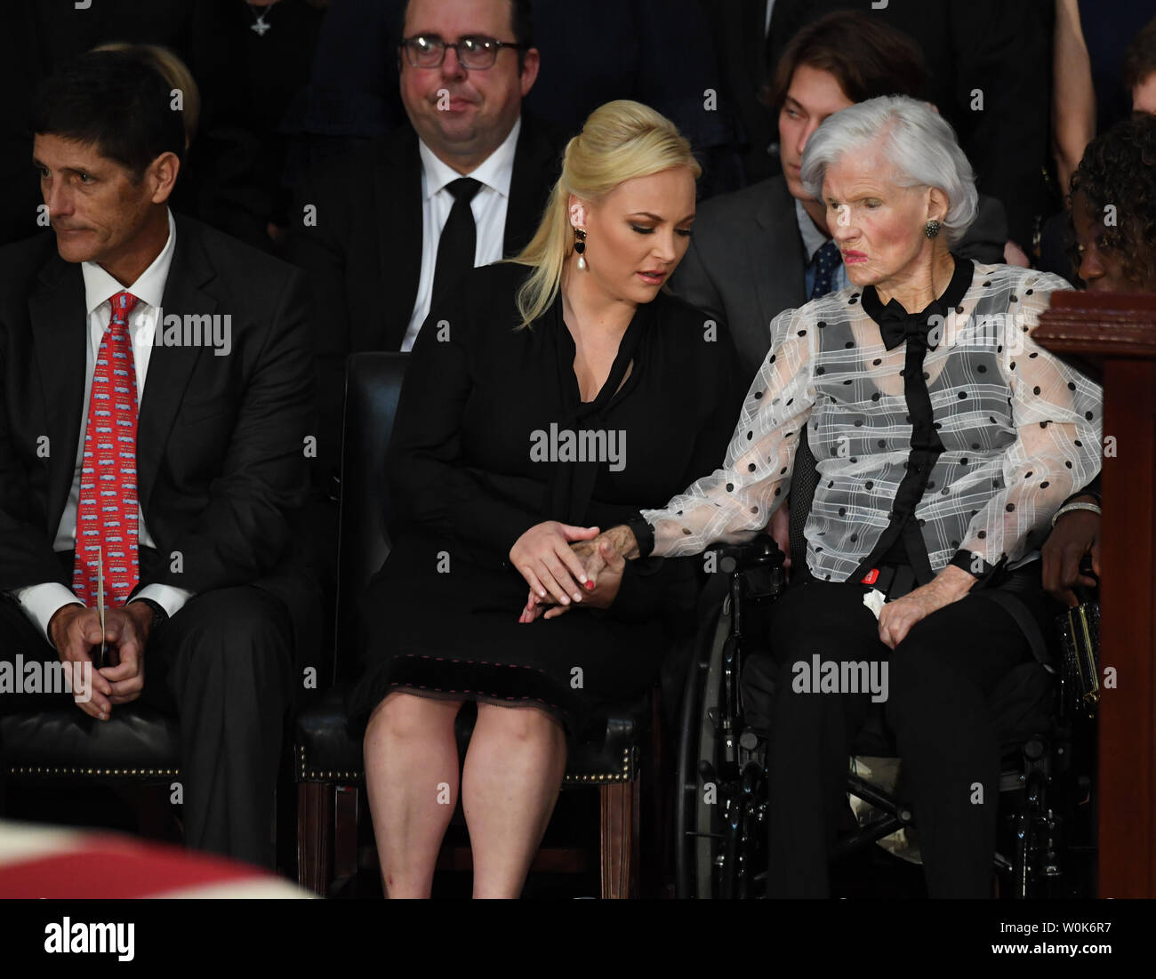 (L-R) Speaker of the House Paul Ryan, Megan McCain and Senator John McCain's mother Roberta McCain sit by the casket of former Senator John McCain as he lies in state at the U.S. Capitol in Washington, DC on Friday, August 31, 2018.  McCain, an Arizona Republican, presidential candidate, and war hero, died August 25th at the age of 81. He is the 31st person to lie in state at the Capitol in 166 years.    Photo by Pat Benic/UPI Stock Photo