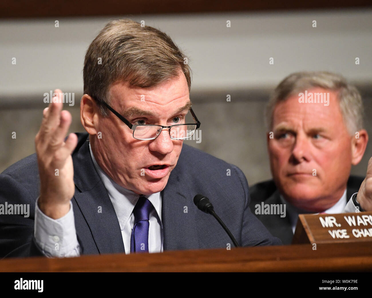 Senate Select Committee on Intelligence Vice Chairman Sen. Jack Warner (D-VA) (L) asks a question as Senator Richard Burr (R-NC) looks on, on Wednesday, September 5, 2018 in the Dirkson Senate Office Building in Washington, DC. The committee wants to examine social media companies' responses to foreign influence operations on social media platforms.             Photo by Pat Benic/UPI Stock Photo