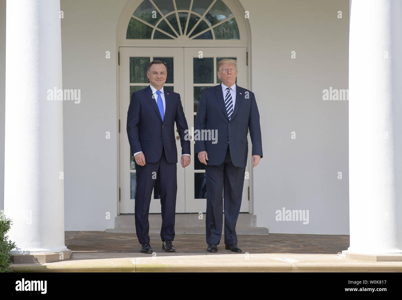 U.S. President Donald Trump and President of Poland Andrzej Duda walk ...