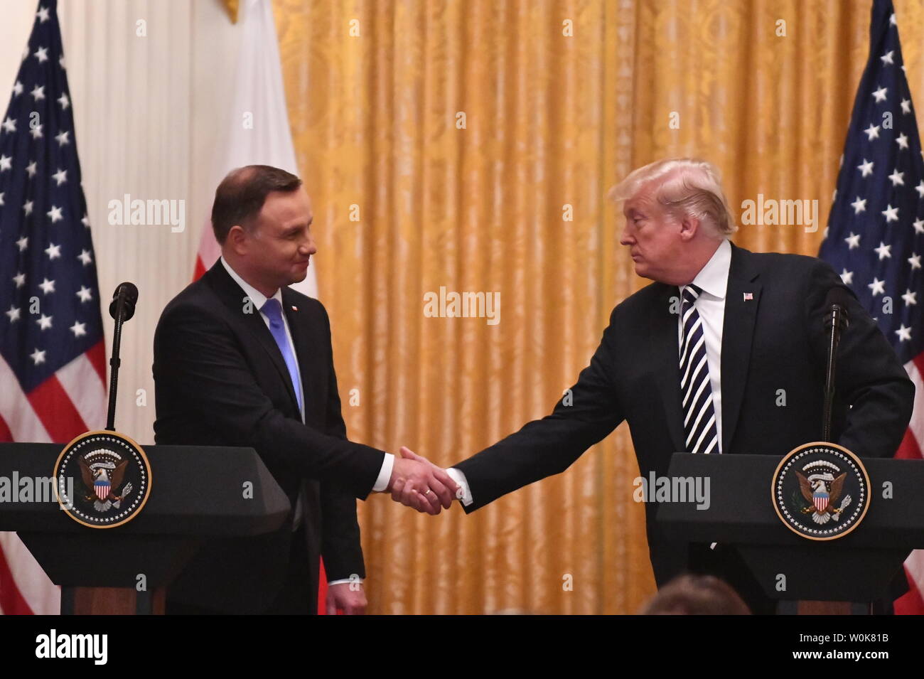 President Donald Trump (R) shakes hands with Polish President Andrzej Duda holds a joint press conference  in the White House in Washington, DC on September 18, 2018.         Photo by Pat Benic/UPI Stock Photo