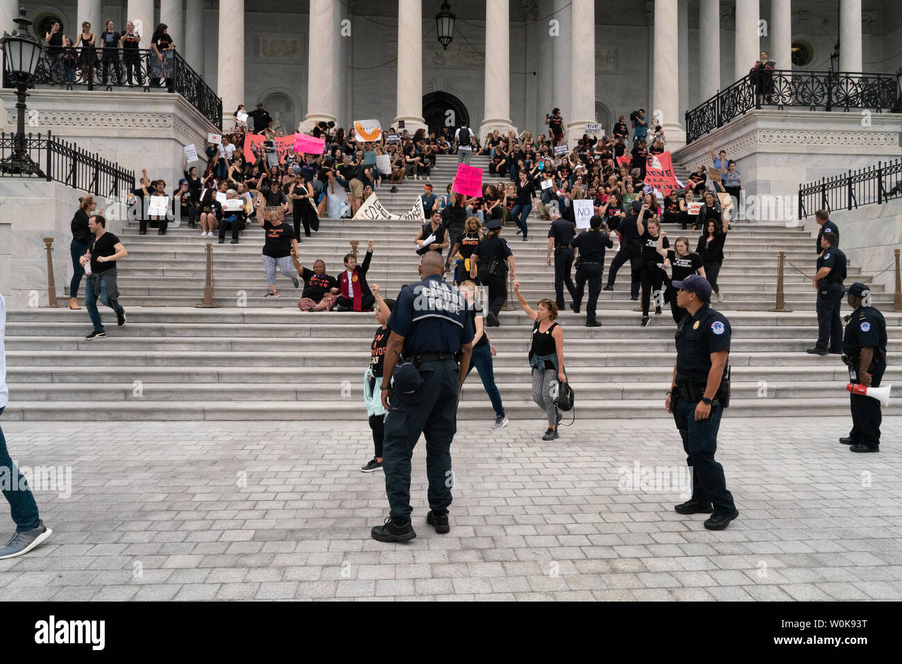 Crowds overrun the Capitol Police and take over the East Steps of the U.S Capitol as they protest the confirmation and swearing in of Supreme Court Associate Justice Brett Kavanaugh in Washington, D.C. October 6, 2018.      Photo by Ken Cedeno/UPI Stock Photo