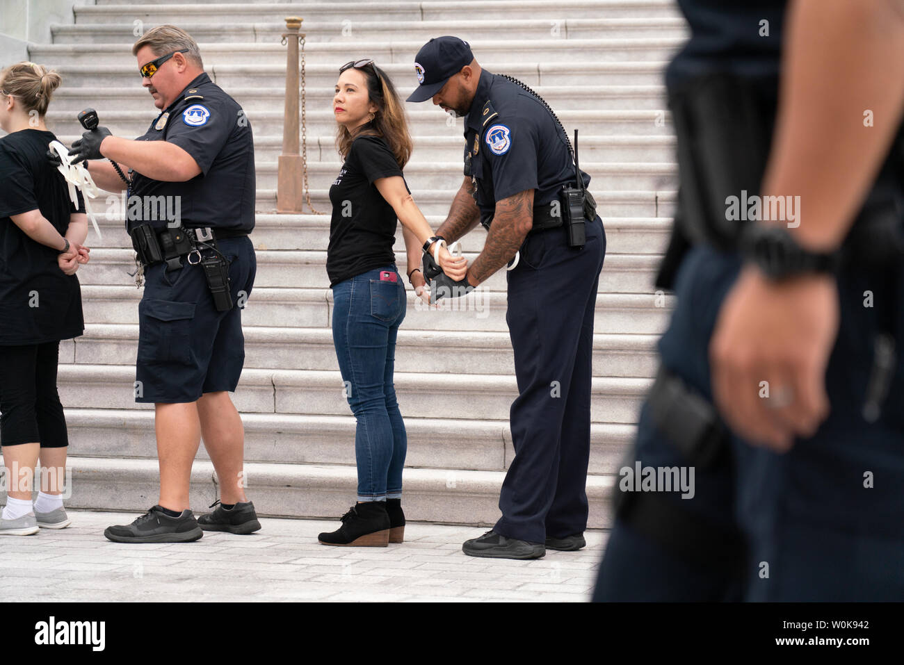 Crowds overrun the Capitol Police and take over the East Steps of the U.S Capitol as they protest the confirmation and swearing in of Supreme Court Associate Justice Brett Kavanaugh in Washington, D.C. October 6, 2018.      Photo by Ken Cedeno/UPI Stock Photo