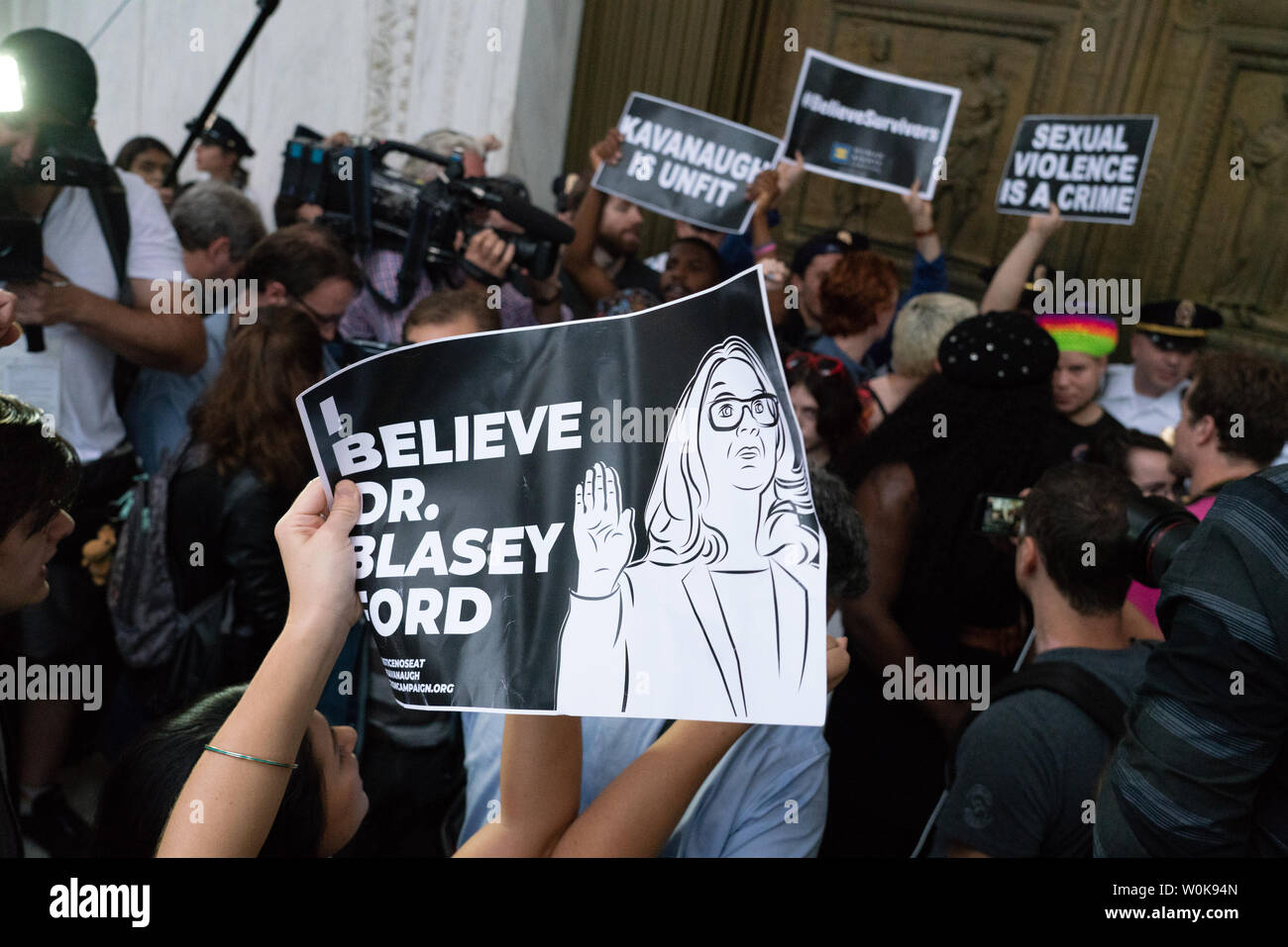 Protesters storm the steps and block the doors of the Supreme Court after over running the Capitol Police against the confirmation and swearing in of Associate Justice Brett Kavanaugh in Washington, D.C. October 6, 2018. Kavanaugh was sworn in inside the Supreme Court this afternoon.       Photo by Ken Cedeno/UPI Stock Photo