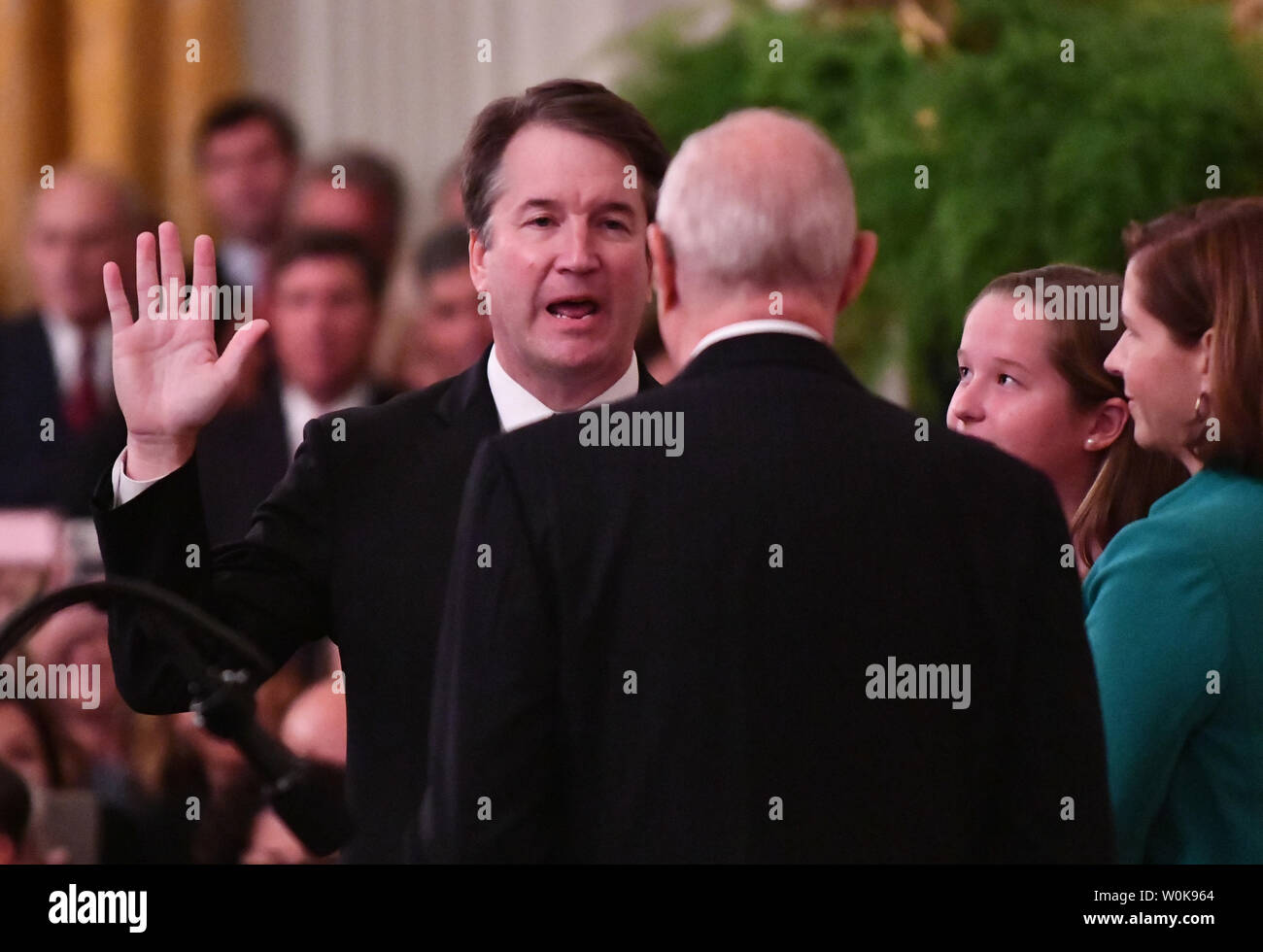 Supreme Court Associate Justice Brett Kavanaugh takes the judiciary oath, delivered by retiring Justice Anthony Kennedy, during his ceremonial swearing-in ceremony at the White House on October 8, 2018 in Washington, D.C. Kavanaugh was joined by his wife Ashley and their children Liza and Margaret. Photo by Pat Benic/UPI Stock Photo