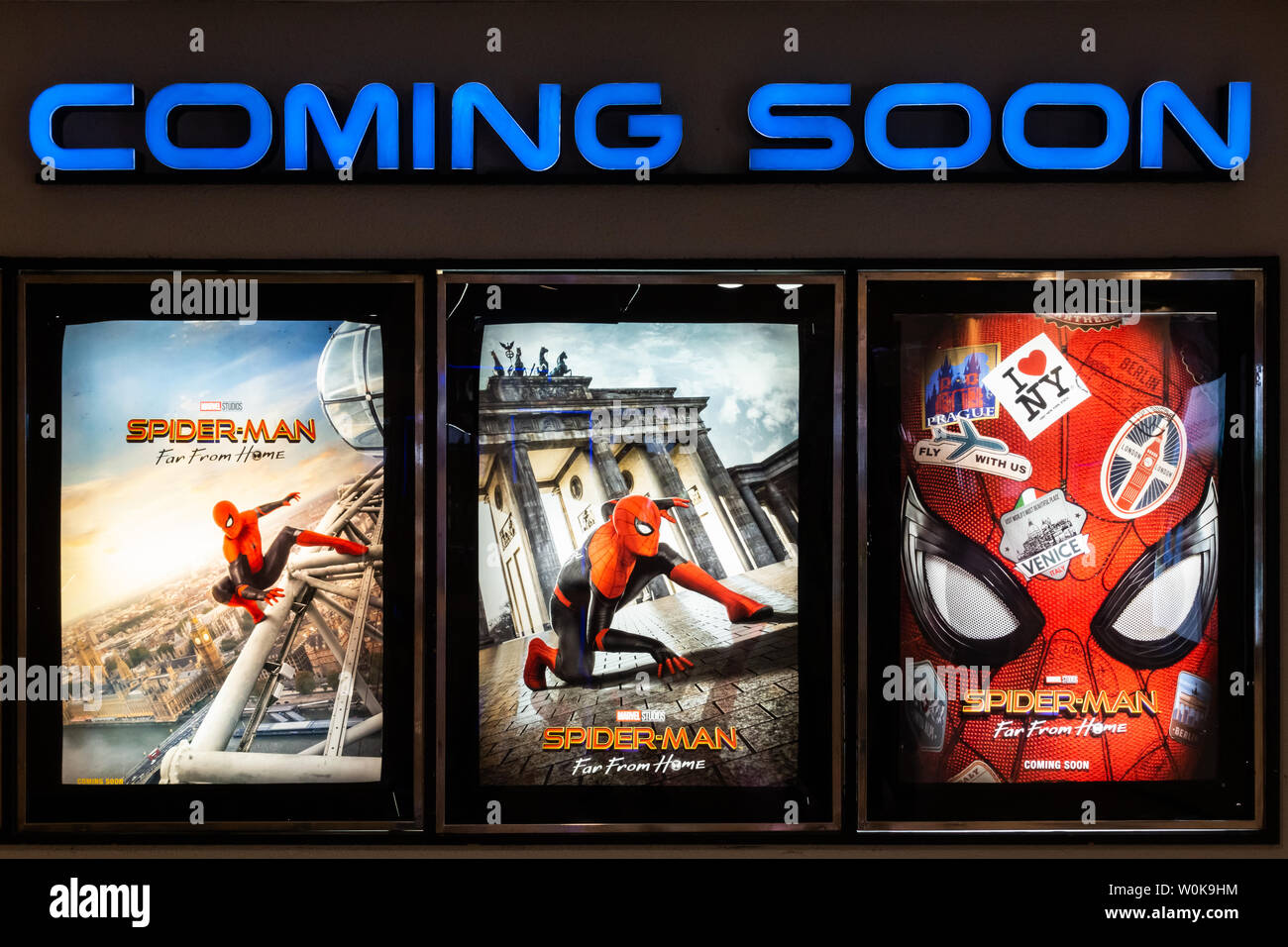 Bangkok, Thailand - Jun 26, 2019: Spider-Man: Far From Home movie poster with coming soon display showing in theatre. Cinema promotional advertisement Stock Photo