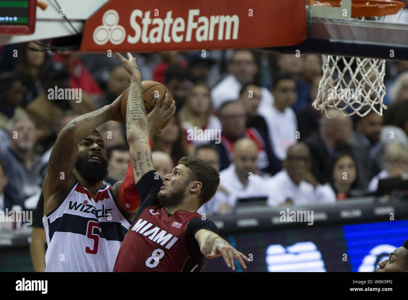 Miami Heat forward Markieff Morris, left, shakes hands with his twin  brother Los Angeles Clippers forward Marcus Morris Sr., right, before Game  1 of a NBA basketball Eastern Conference finals playoff series