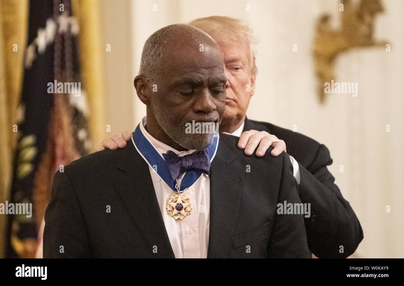 President Donald Trump awards the Medal of Freedom to Alan Page, football great and Minnesota Supreme Court justice, during a ceremony in the East room of the White House in Washington, D.C. on November 16, 2018. Photo by Pat Benic/UPI Stock Photo