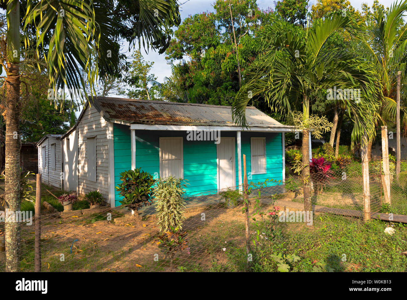 Typical colourful tobacco worker's small house in the rural village of San Juan y Martinez, Pinar del Rio Province, Cuba, Caribbean Stock Photo