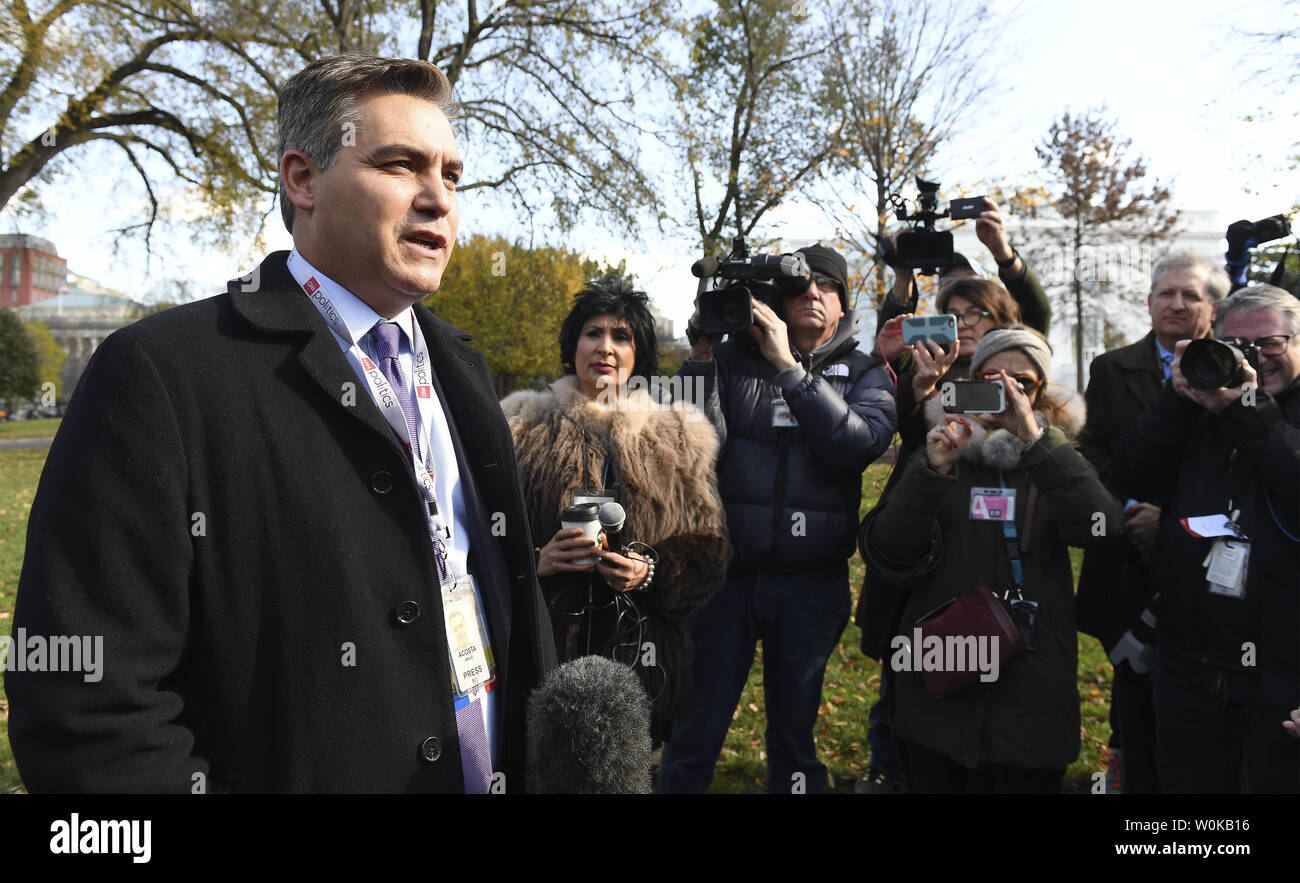 CNN reporter Jim Acosta (L) answers questions after entering the White House grounds and having his White House press pass reactivated following an decision requiring the White House to immediately return Acosta's press pass by U.S. District Judge Timothy Kelly on November 16, 2018 in Washington, D.C.  CNN's Acosta's press pass was revoked following a recent President Donald Trump press conference.  Photo by Pat Benic/UPI Stock Photo
