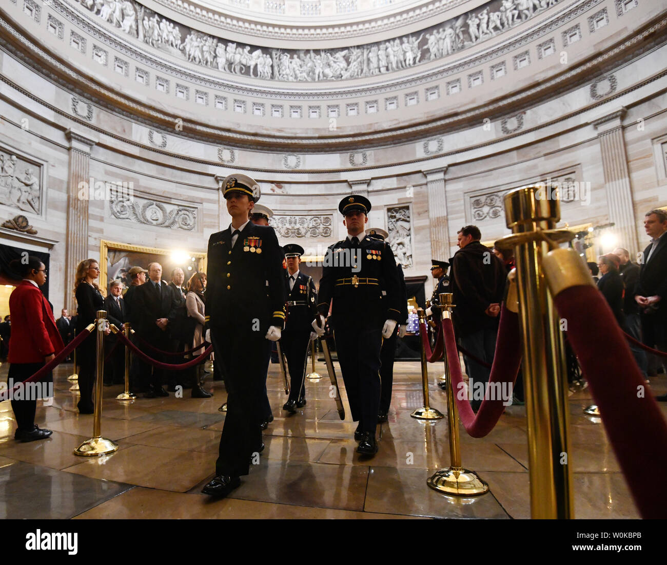 The Honor Guard changes as former President George H. W. Bush lies in state at the U.S. Capitol Rotunda, in Washington, D.C. on December 4, 2018.  There will be a State Funeral at the National Cathedral on Wednesday, December 5, 2018.   Photo by Pat Benic/UPI Stock Photo