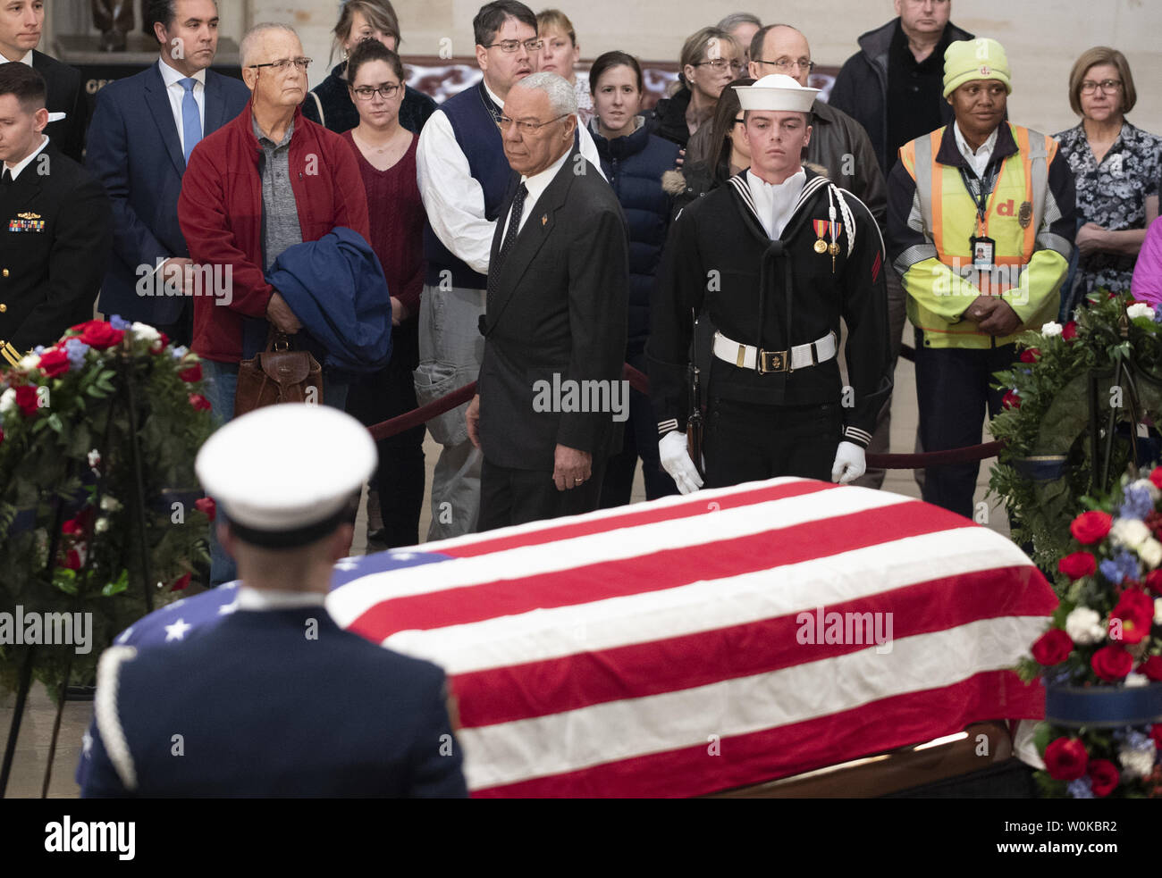 Colin Powell, former secretary of state and general of the first Gulf War (Desert Storm) under former President George H. W. Bush,  views the coffin of the 41st president as he lies in state at the U.S. Capitol Rotunda, in Washington, D.C. on December 4, 2018.  There will be a State Funeral at the National Cathedral on Wednesday, December 5, 2018.   Photo by Pat Benic/UPI Stock Photo