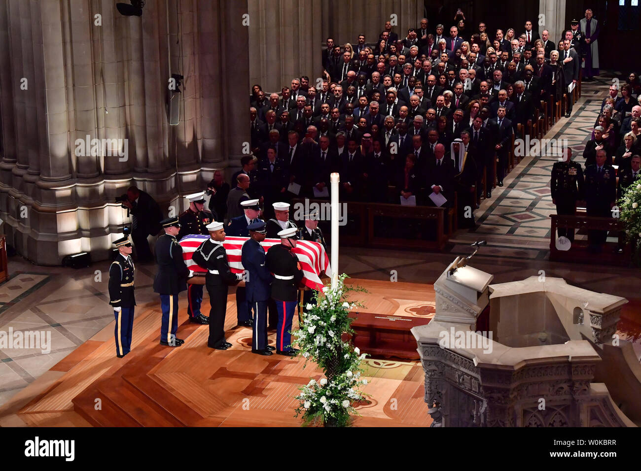 The casket arrives for the funeral of former President George H.W. Bush at the National Cathedral in Washington D.C. on December 5, 2018.   Photo by Kevin Dietsch/UPI Stock Photo