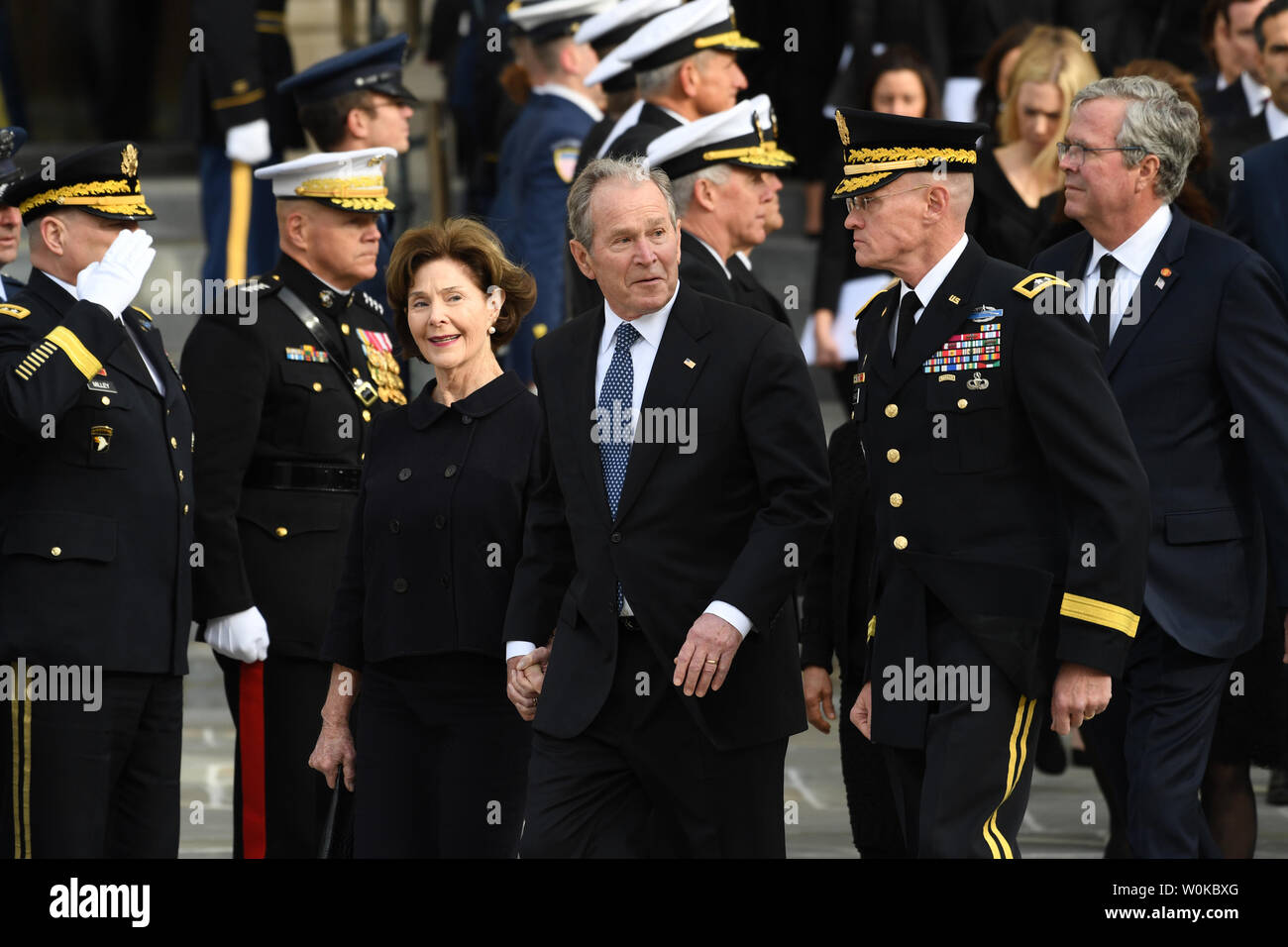 Former President George W. Bush and wife Laura leave following the funeral of the 41st  President of the United States George Herbert Walker Bush at the National Cathedral in Washington D.C. on December 5, 2018.   Photo by Pat Benic/UPI Stock Photo