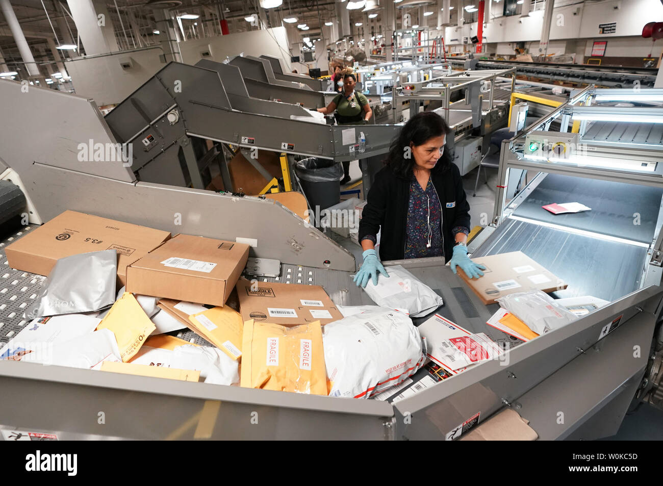 U s postal service processing center hires stock photography and