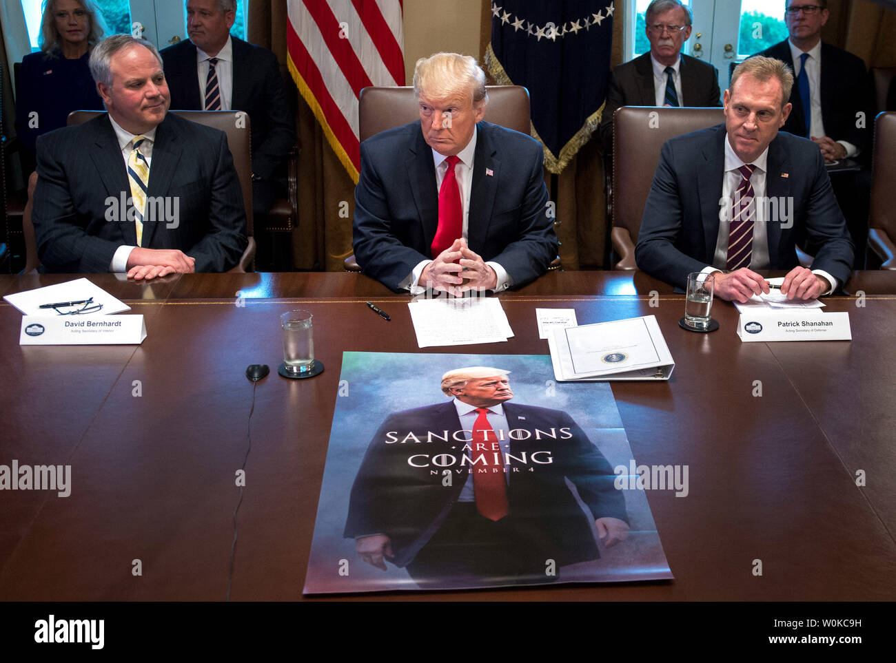 President Donald Trump speaks to the media during a cabinet meeting as a poster on sanctions is seen on the table, at the White House in Washington, D.C. on January 2, 2019. Trump said he will keep the government closed for as long as possible until he gets funding for her southern border wall. Photo by Kevin Dietsch/UPI Stock Photo