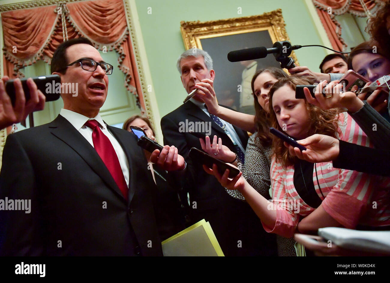 Treasury Secretary Steve Mnuchin speaks with reporters as he departs the Republican policy luncheon on Capitol Hill, on January 15, 2019 in Washington, D.C. Mnuchin was on Capitol Hill to discuss Russian sanctions. Photo by Kevin Dietsch/UPI Stock Photo