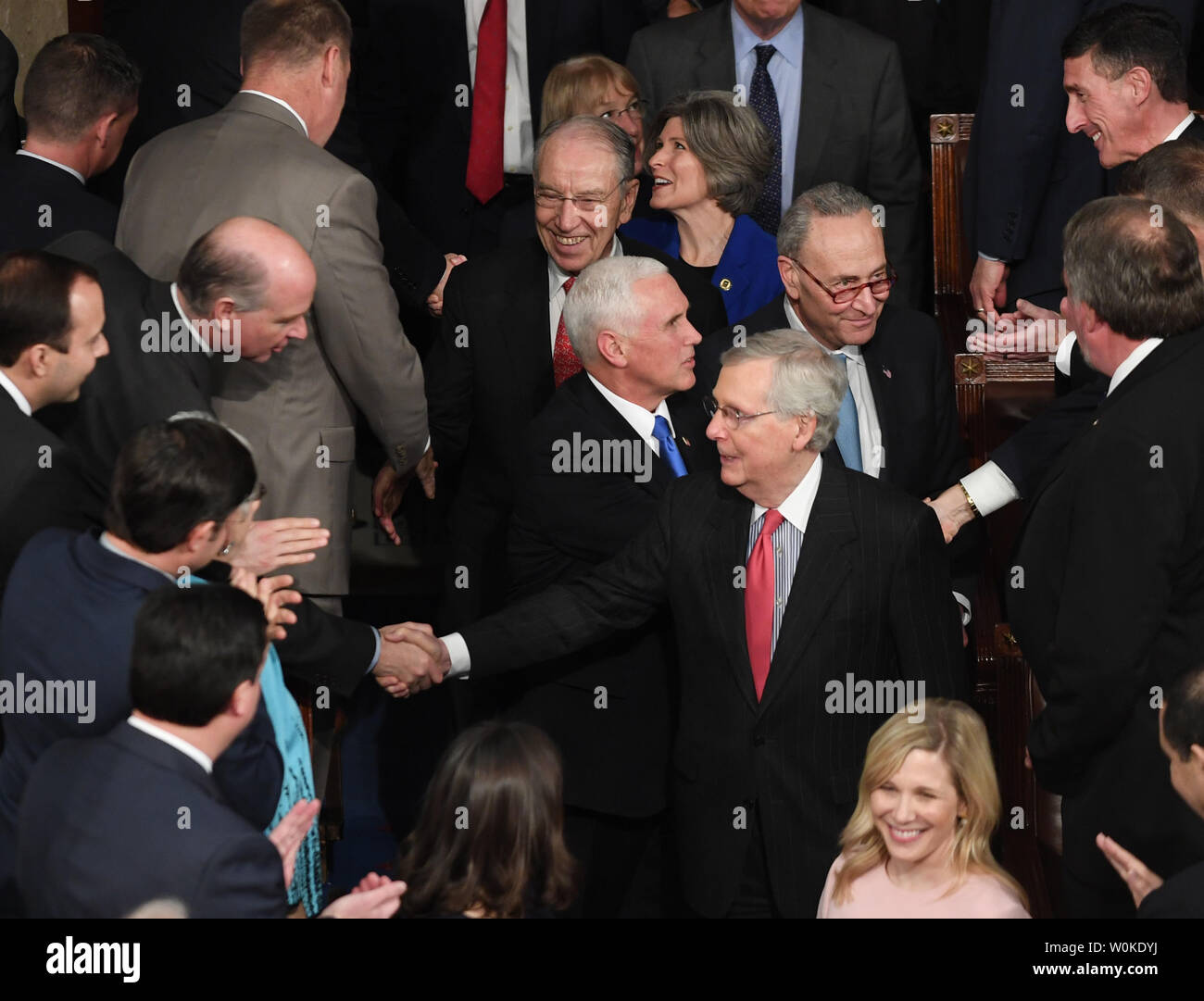Senate Majority Leader Mitch McConnell, Vice President Mike Pence and Minority Leader Chuck Schumer lead in members of the Senate for President Donald Trump's State of the Union address to a joint session of Congress in the House Chamber of the U.S. Capitol in Washington, DC on February 5, 2019.  Photo by Pat Benic/UPI Stock Photo