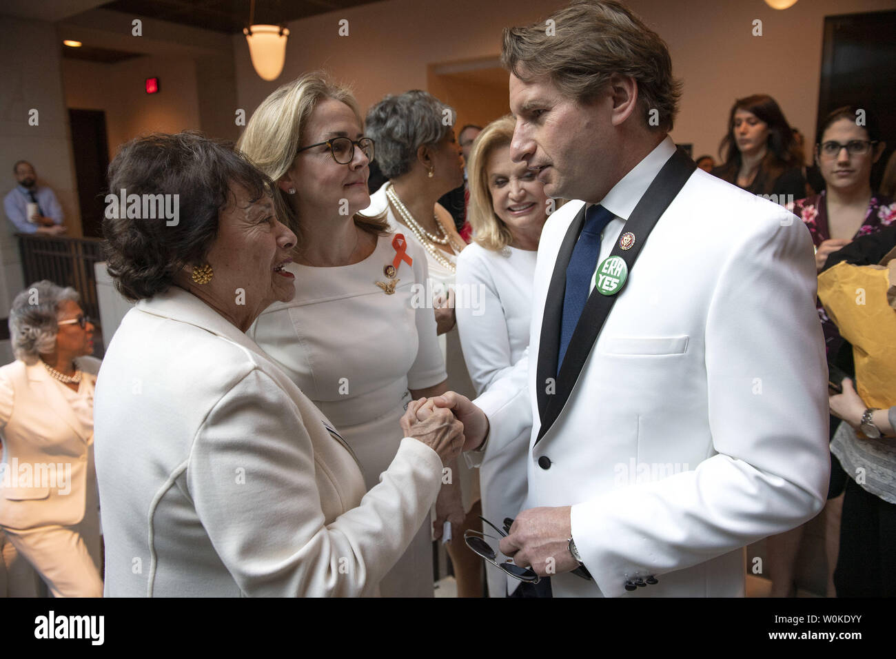 Rep. Dean Phillips (R), DMN, greets Rep. Nita Lowey, DNY, after the
