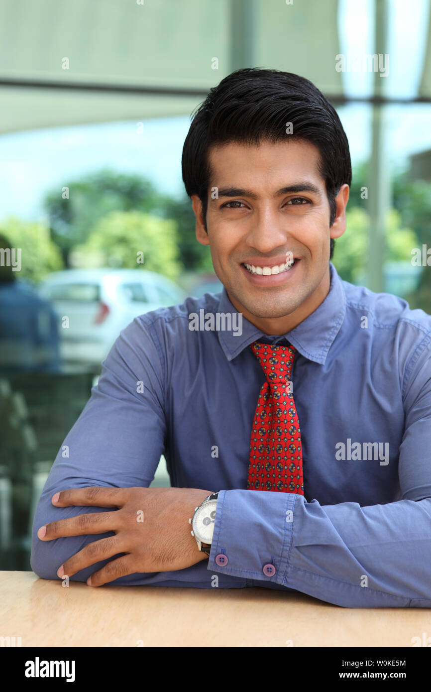 Portrait of an Indian businessman smiling Stock Photo - Alamy