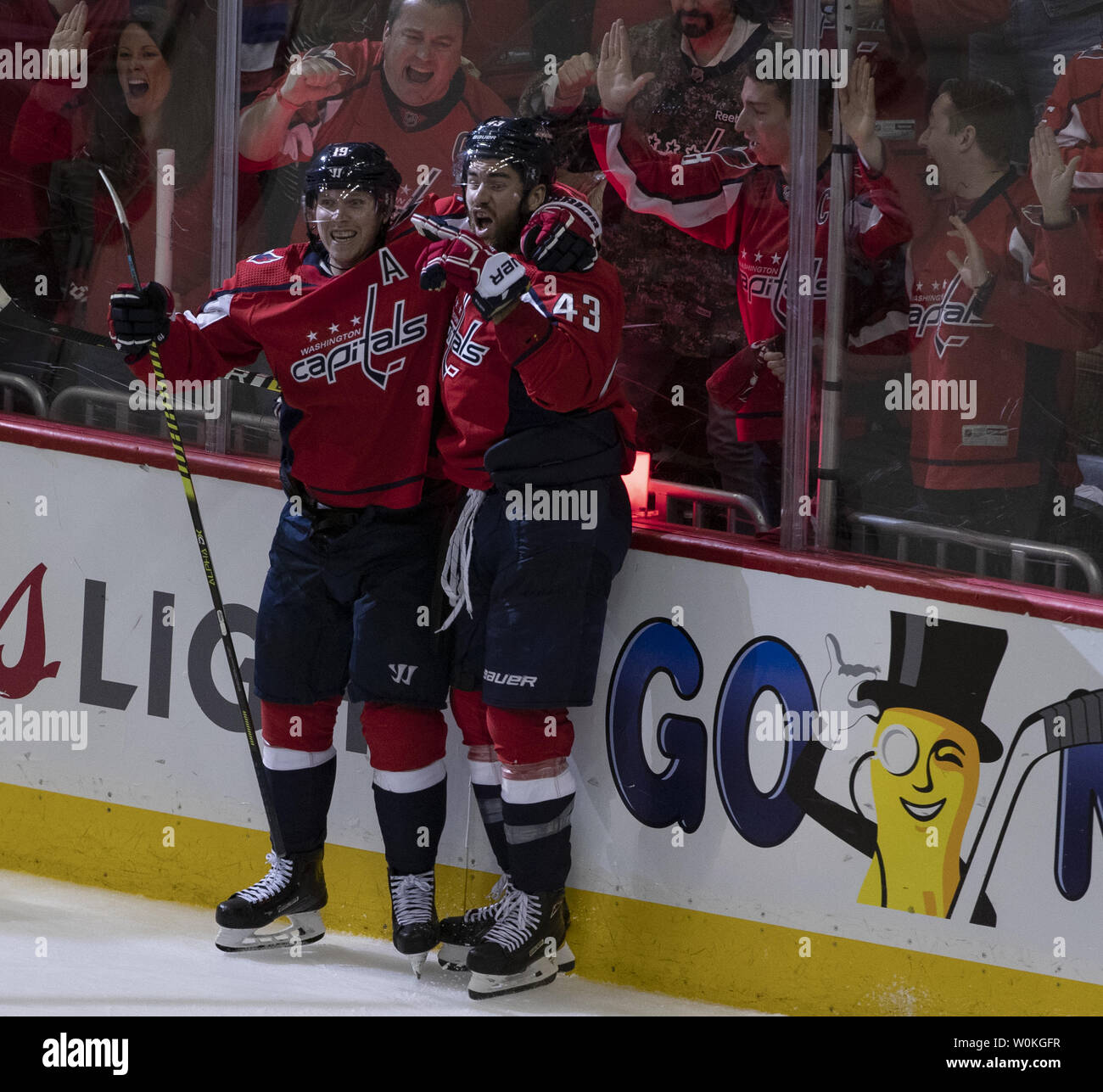Washington Capitals right wing Tom Wilson (43) celebrates with Capitals center Nicklas Backstrom (19) after scoring on Carolina Hurricanes goaltender Petr Mrazek (34) during the third period at Capital One Arena in Washington, D.C. on April 13, 2019. The Washington Capitals lead the best of seven series with one win. Photo by Alex Edelman/UPI Stock Photo
