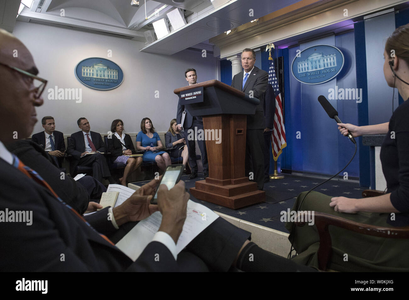 Ohio Governor John Kasich, joined by White House Press Secretary Josh Earnest, speaks to the press on the Trans-Pacific Partnership following a meeting with President Barack Obama at the White House in Washington, D.C. on September 16, 2016. Photo by Kevin Dietsch/UPI Stock Photo