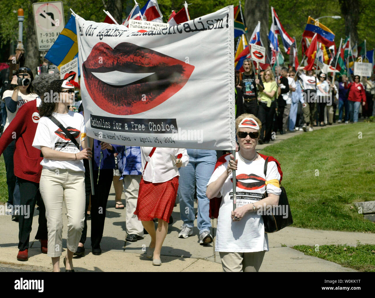Catholics for a Free Choice supporters march to the Vatican Embassy in Washington, April 24, 2004. Anti-abortion activists are staging their own protests a day ahead of a major pro-choice rally on the National Mall. (UPI Photo/Yuri Gripas) Stock Photo
