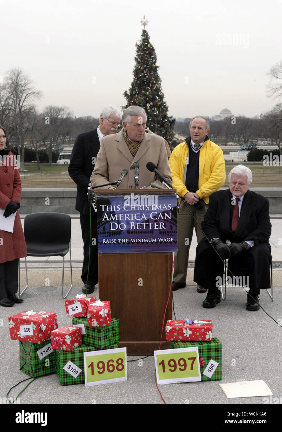 House Minority Whip Steny Hoyer, D-Md., center, speaks at a joint news conference with  Sen. Edward Kennedy, D-Mass., and Rep. George Miller, D-Calif., outside of the U.S. Capitol building in Washington, December 14, 2005. Senate and Congress democrats hold a news conference to discuss 'the true meaning of Christmas: hope, generosity, and goodwill toward others.' The lawmakers will call on Congress to raise the national minimum wage before leaving for the year and they will release a report from the Center for Economic and Policy Research detailing the 'difficulty that families living on the m Stock Photo