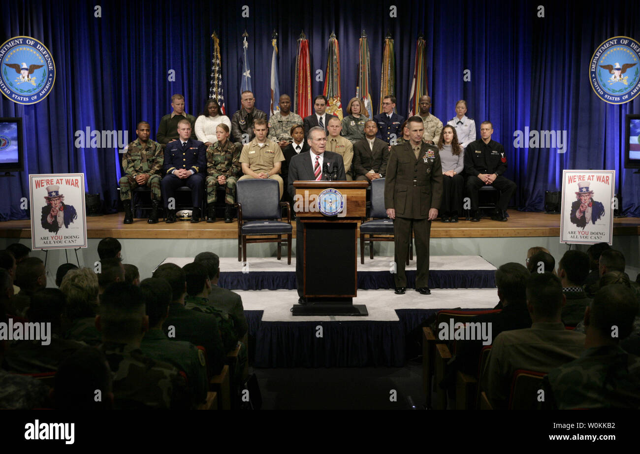 U.S. Defense Secretary Donald Rumsfeld, center, and General Peter Pace, Chairman of the Joint Chiefs of Staff, hold a Pentagon Town Hall meeting in Washington, December 15, 2005. (UPI Photo/Yuri Gripas) Stock Photo