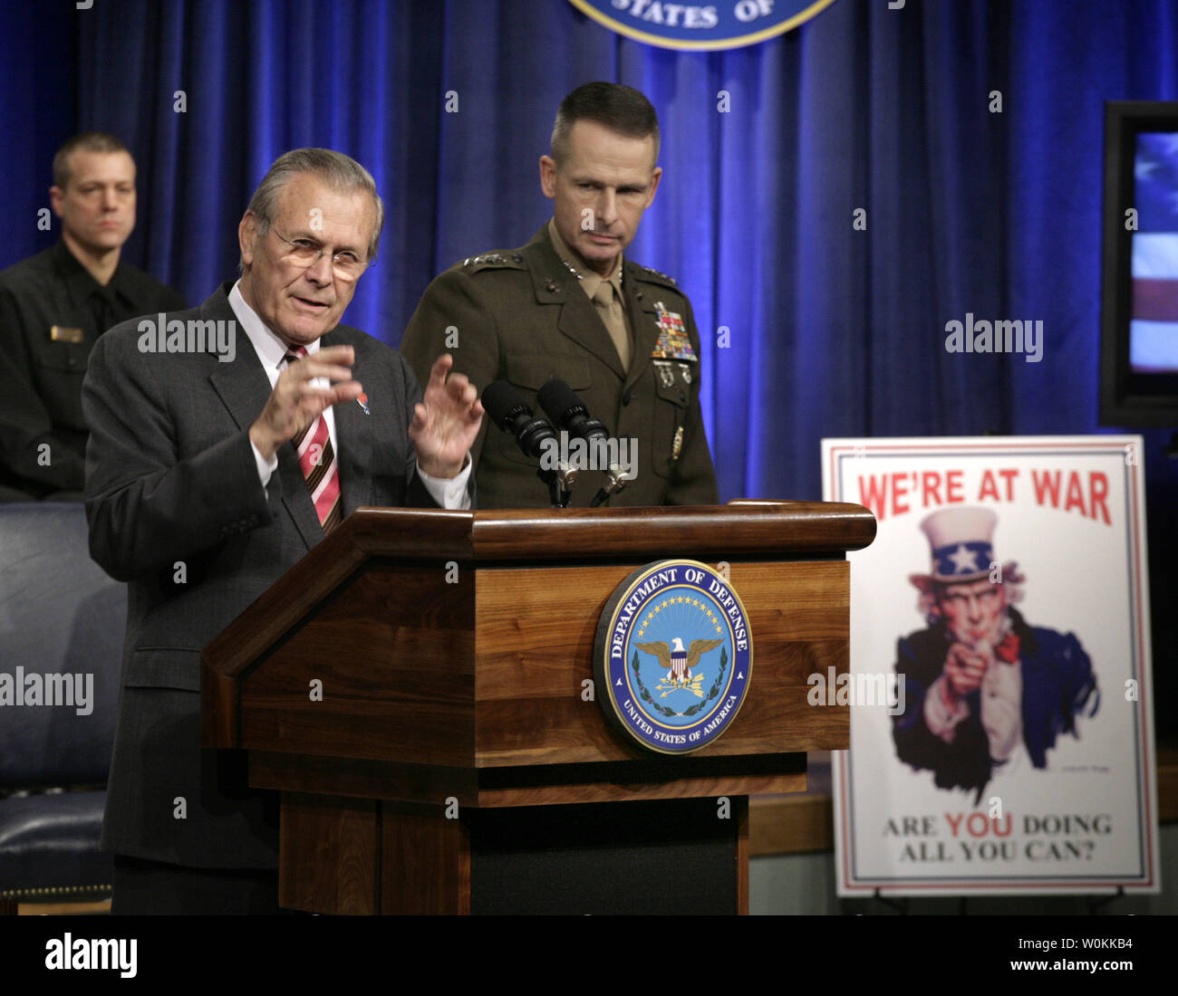 U.S. Defense Secretary Donald Rumsfeld, left, and General Peter Pace, Chairman of the Joint Chiefs of Staff, speak at the Pentagon Town Hall meeting in Washington, December 15, 2005. (UPI Photo/Yuri Gripas) Stock Photo