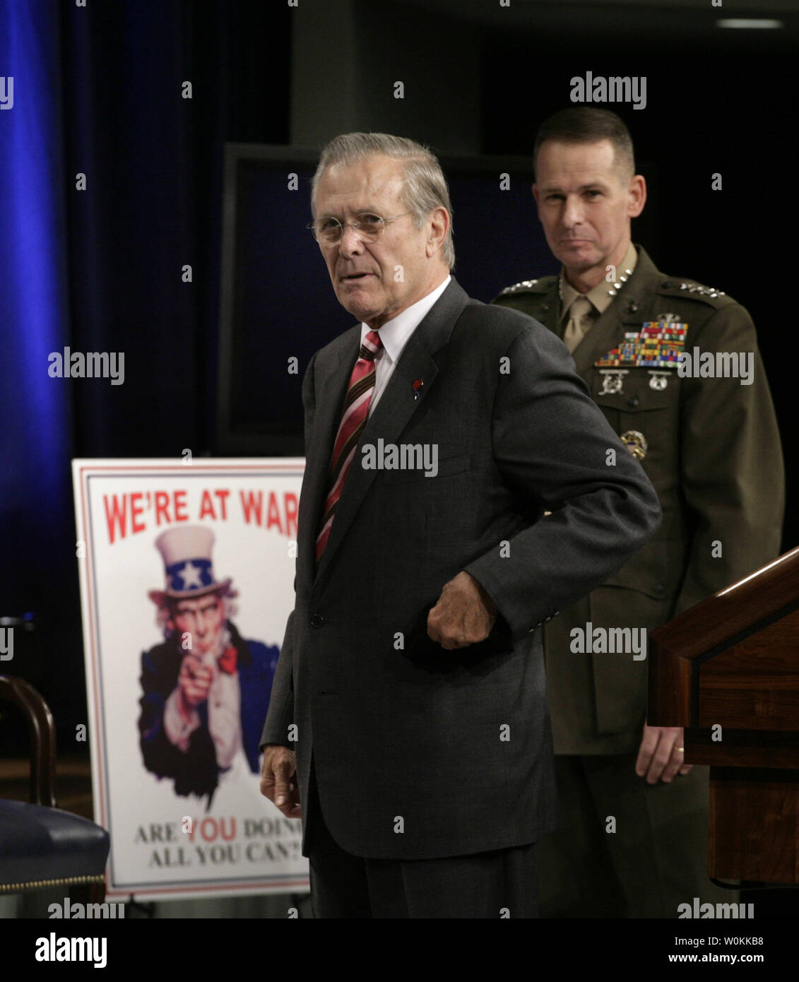 U.S. Defense Secretary Donald Rumsfeld, left, and General Peter Pace, Chairman of the Joint Chiefs of Staff, attend a Pentagon Town Hall meeting in Washington, December 15, 2005. (UPI Photo/Yuri Gripas) Stock Photo