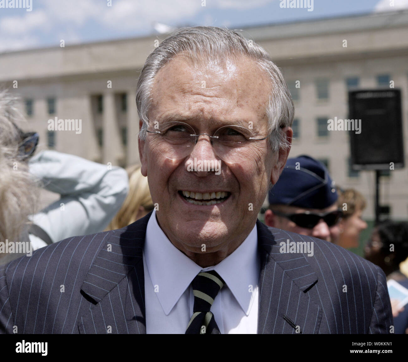 U.S. Defense Secretary Donald H. Rumsfeld leaves after a Memorial ground-breaking ceremony outside of the Pentagon in Washington on June 15, 2006. The Pentagon Memorial will commemorate the 184 innocent lives lost in the Pentagon and on American Airlines Flight 77 on September 11, 2001. (UPI Photo/Yuri Gripas) Stock Photo