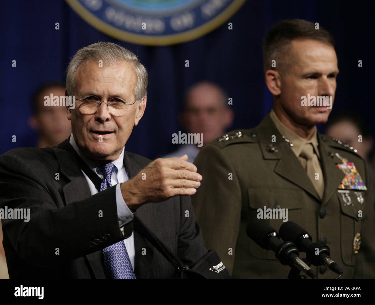 U.S. Defense Secretary Donald Rumsfeld (L) speaks as  General Peter Pace, Chairman of the Joint Chiefs of Staff, (R) looks on at the Pentagon Town Hall meeting in Washington, September 22, 2006.  (UPI Photo/Yuri Gripas) Stock Photo