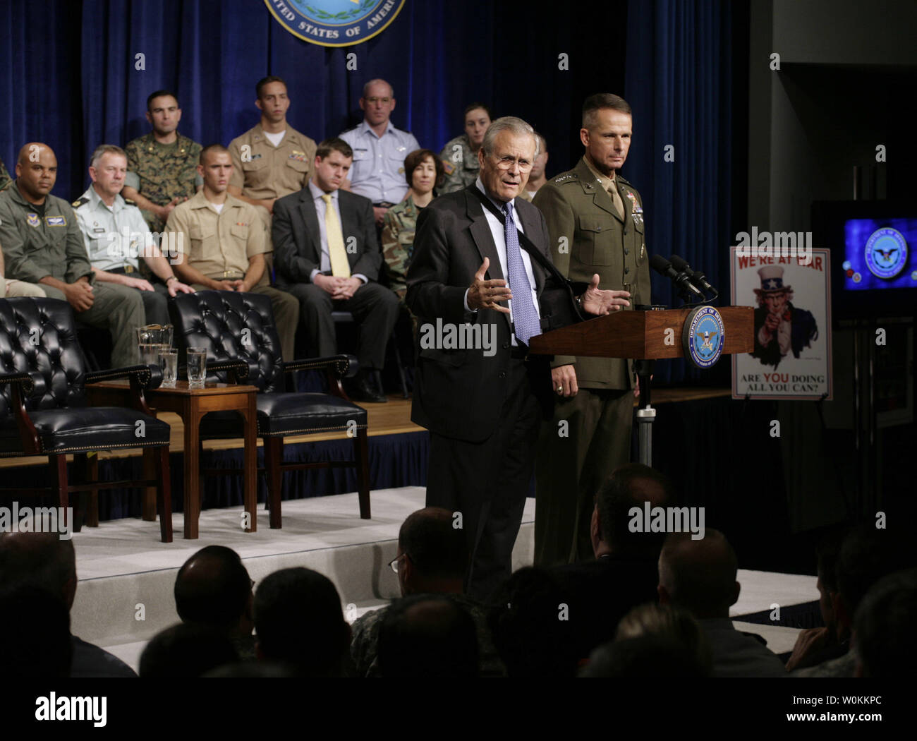 U.S. Defense Secretary Donald Rumsfeld (C) and General Peter Pace, Chairman of the Joint Chiefs of Staff, (R) hold a Pentagon Town Hall meeting in Washington, September 22, 2006.  (UPI Photo/Yuri Gripas) Stock Photo