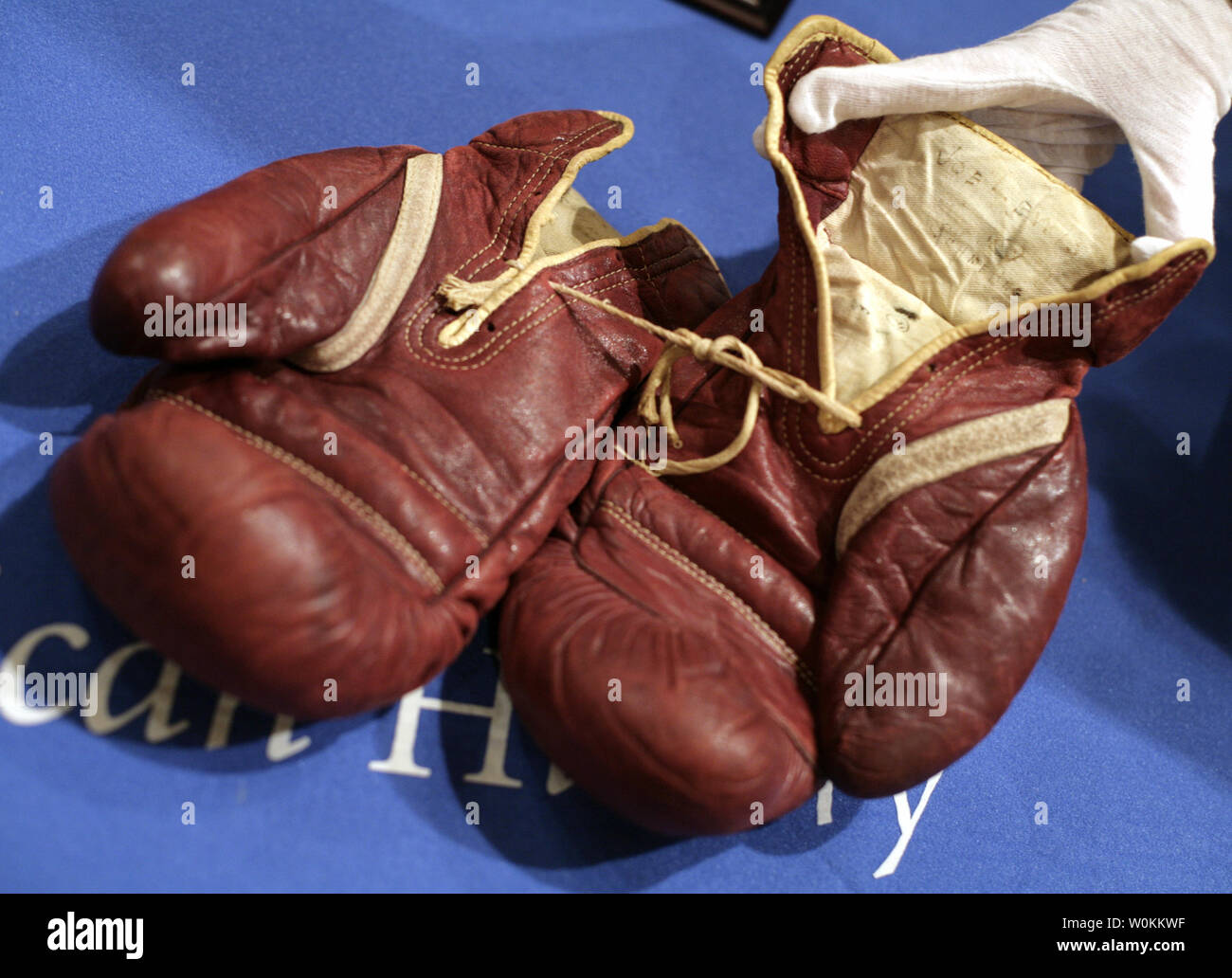 This pair of leather boxing gloves were worn by Joe Louis in the 1936 bout  with the German boxer Max Schmeling in New York City. Although…