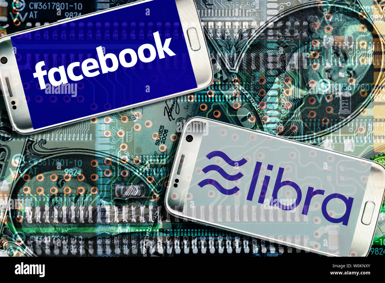 Logos of Facebook and Libra on smartphone screens, libra cryptocurrency Stock Photo