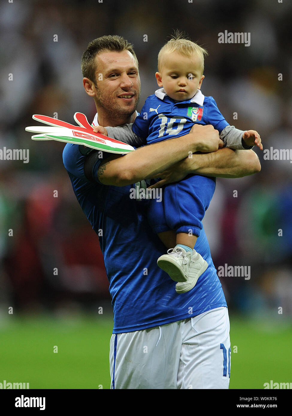 Antonio Cassano of Italy celebrates at full-time with his son following the Euro 2012 Semi-Final match at the National Stadium in Warsaw, Poland on June 28, 2012. UPI/Chris Brunskill Stock Photo
