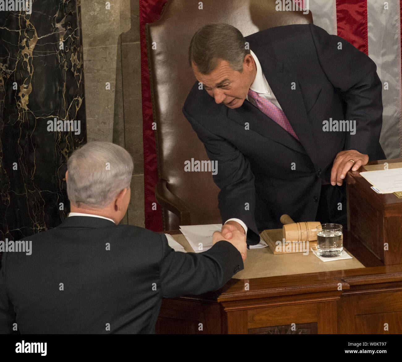 Israeli Prime Minister Benjamin Netanyahu shakes hands with Republican House Speaker John Boehner (R), who invited Netanyahu, as he arrives to address a joint session of the United States Congress on Capitol Hill in Washington, DC on March 3, 2015.    In a divisive speech, Netanyahu argued against any deal with Iran on their nuclear capability as nuclear negotiations continue with the Obama administration and Iran in Geneva.  Photo by Pat Benic/UPI Stock Photo