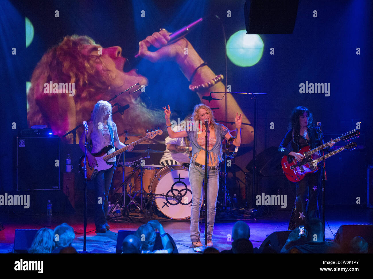 With a Led Zeppelin movie in the background, Lez Zeppelin belts out a  number at The Hamilton Live venue in downtown Washington, DC on June 7,  2015. The all-girl band played the