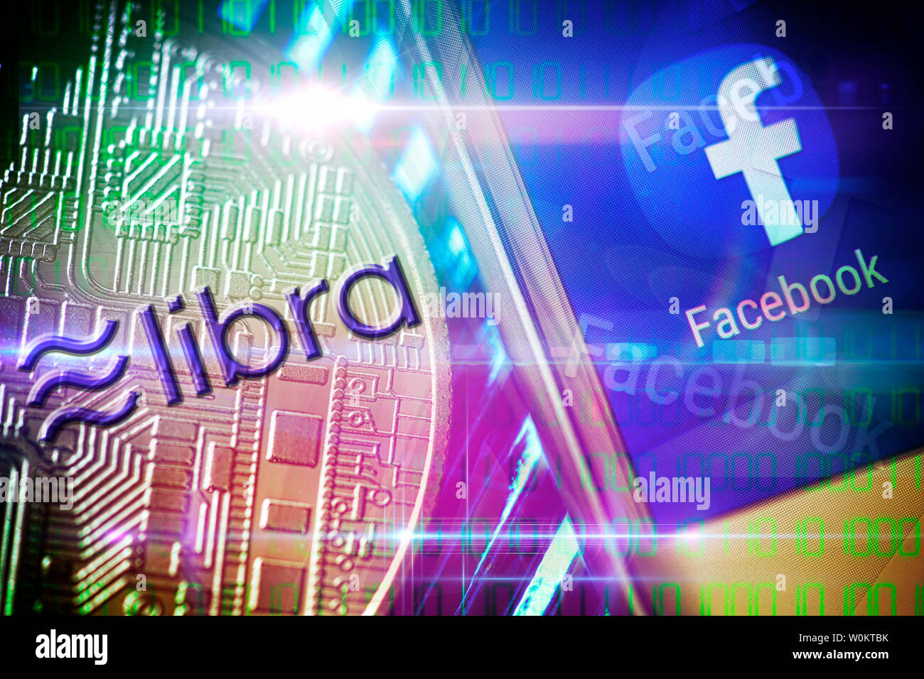 Facebook app on a smartphone screen and coin, libra cryptocurrency Stock Photo