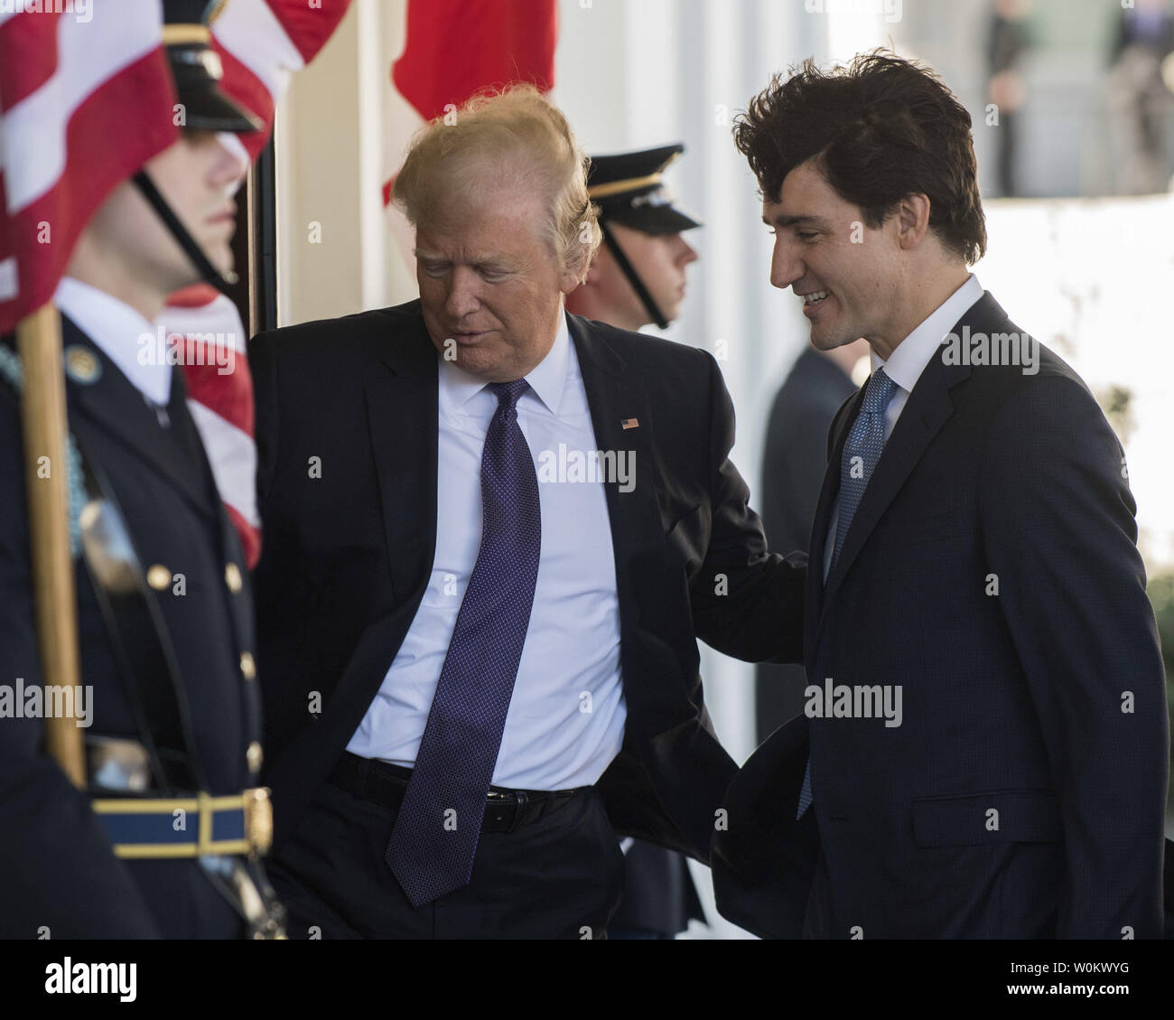 U.S. President Donald Trump greets Canada's Prime Minister Justin Trudeau on a windy day to the West Wing of the White House in Washington D.C. on February 13, 2017. The two leaders will have meetings and a press conference later in the day.   Photo by Pat Benic/UPI Stock Photo