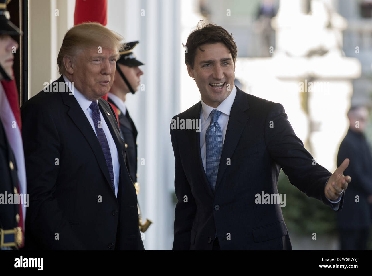 U.S. President Donald Trump greets Canada's Prime Minister Justin Trudeau on a windy day to the West Wing of the White House in Washington D.C. on February 13, 2017. The two leaders will have meetings and a press conference later in the day.   Photo by Pat Benic/UPI Stock Photo